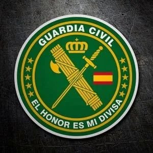Escudo circular de la Guardia Civil con fondo verde y el lema El honor es mi divisa